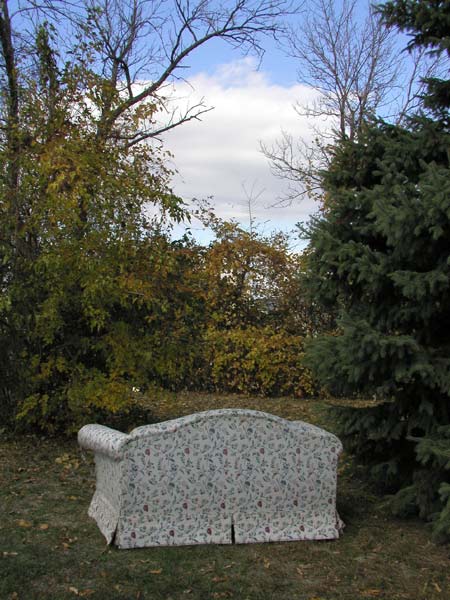 abandoned sofa, seen at the playground