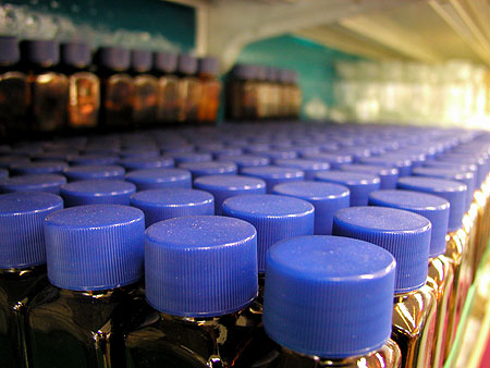 lots and lots of blue bottle tops