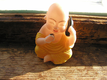 buddha with a cell phone