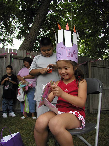 lucia tearing into her presents