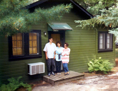 Up North at a cabin in the 80s wearing some very 80s fashions