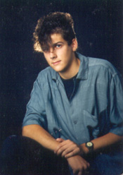 Tom's graduation photo, with 80s hair