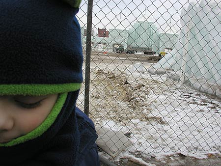 the little man in front of the safety fence