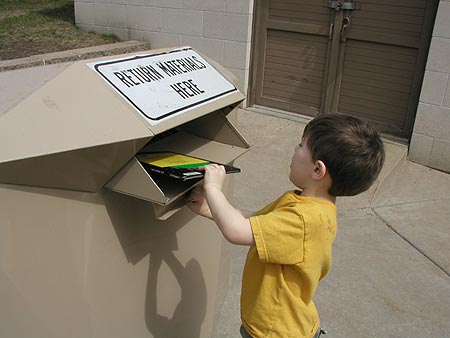 the little man returns his library book