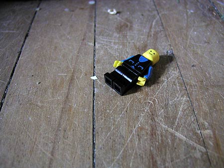 smiling on scuffed floor