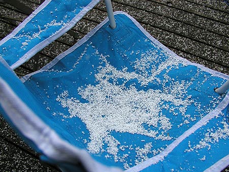 snowy chair in spring