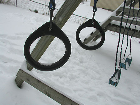 snow covered swingset